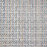 Patterned carpet with a geometric design in blue, grey tan, green and white