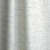 Gently draped fabric in a linear check pattern in shades of pastel aqua blue on a white field.