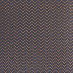 Patterned fabric with tan zigzag design on a navy background
