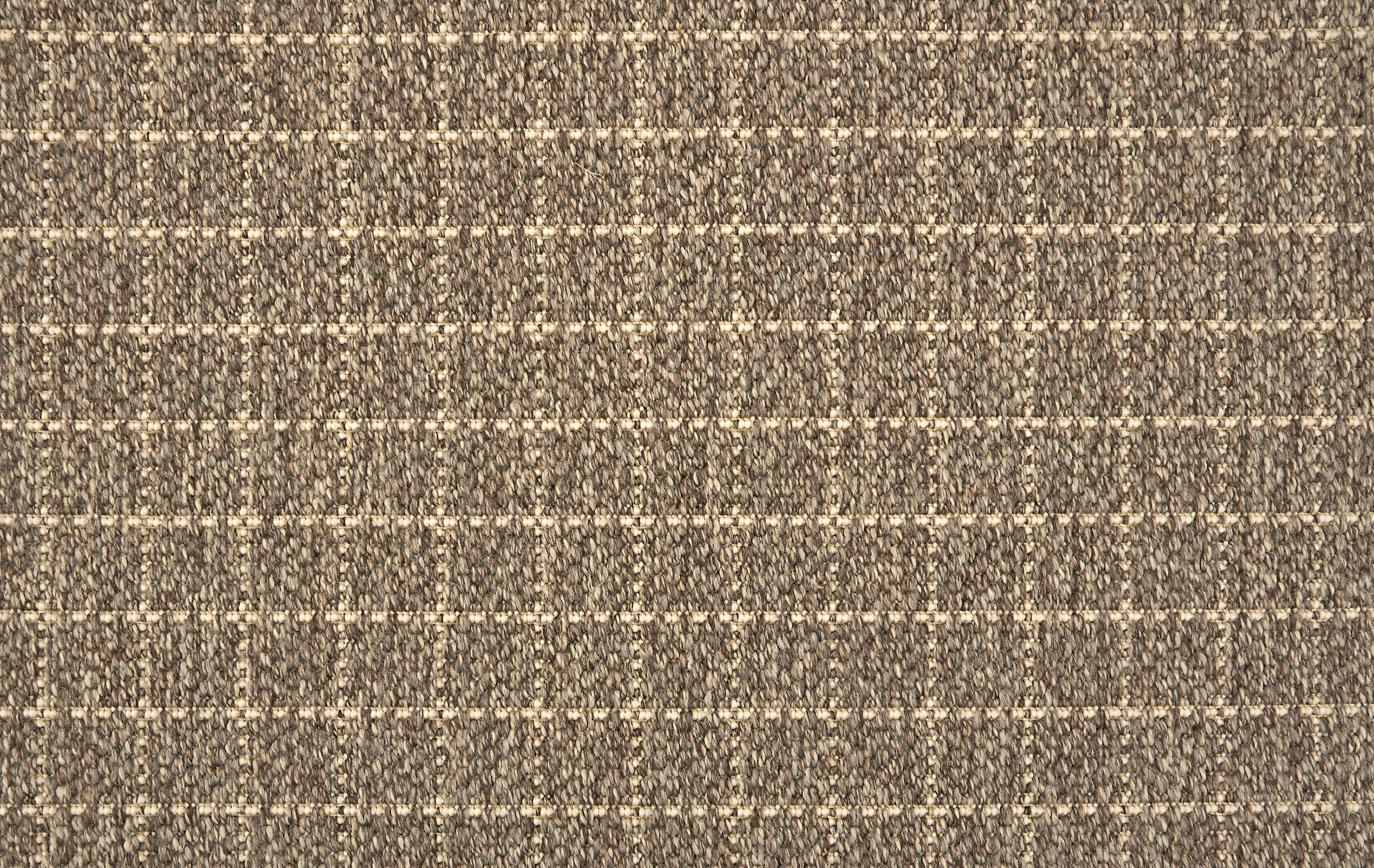 Broadloom carpet with windowpane pattern in brown. 