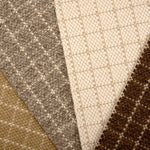 Broadloom carpet with windowpane check pattern in neutral colors. 