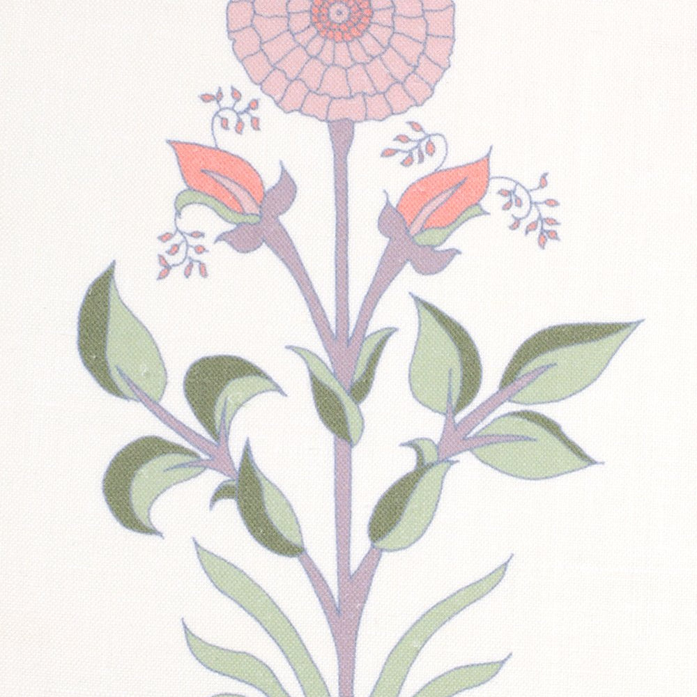 Detail of fabric in a large-scale marigold print in pink, purple and green on a white field.