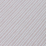 Detail of a wallpaper panel in a painterly herringbone print in mauve on a light blue field.