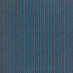 Wallpaper panel in a painterly herringbone print in turquoise and pink on a navy field.