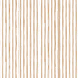 Detail of fabric in a painterly stripe pattern in bronze on a white field.