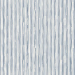 Detail of wallpaper in a painterly stripe pattern in navy on a white field.