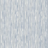 Detail of wallpaper in a painterly stripe pattern in navy on a white field.