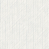 Detail of wallpaper in a painterly uneven grid pattern in light blue on a white field.