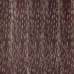 Detail of wallpaper in an abstract textural print in brown on a tan field.