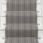Striped flatweave runner in grey and blue on white staircase