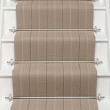 Striped flatweave runner in light grey on white staircase