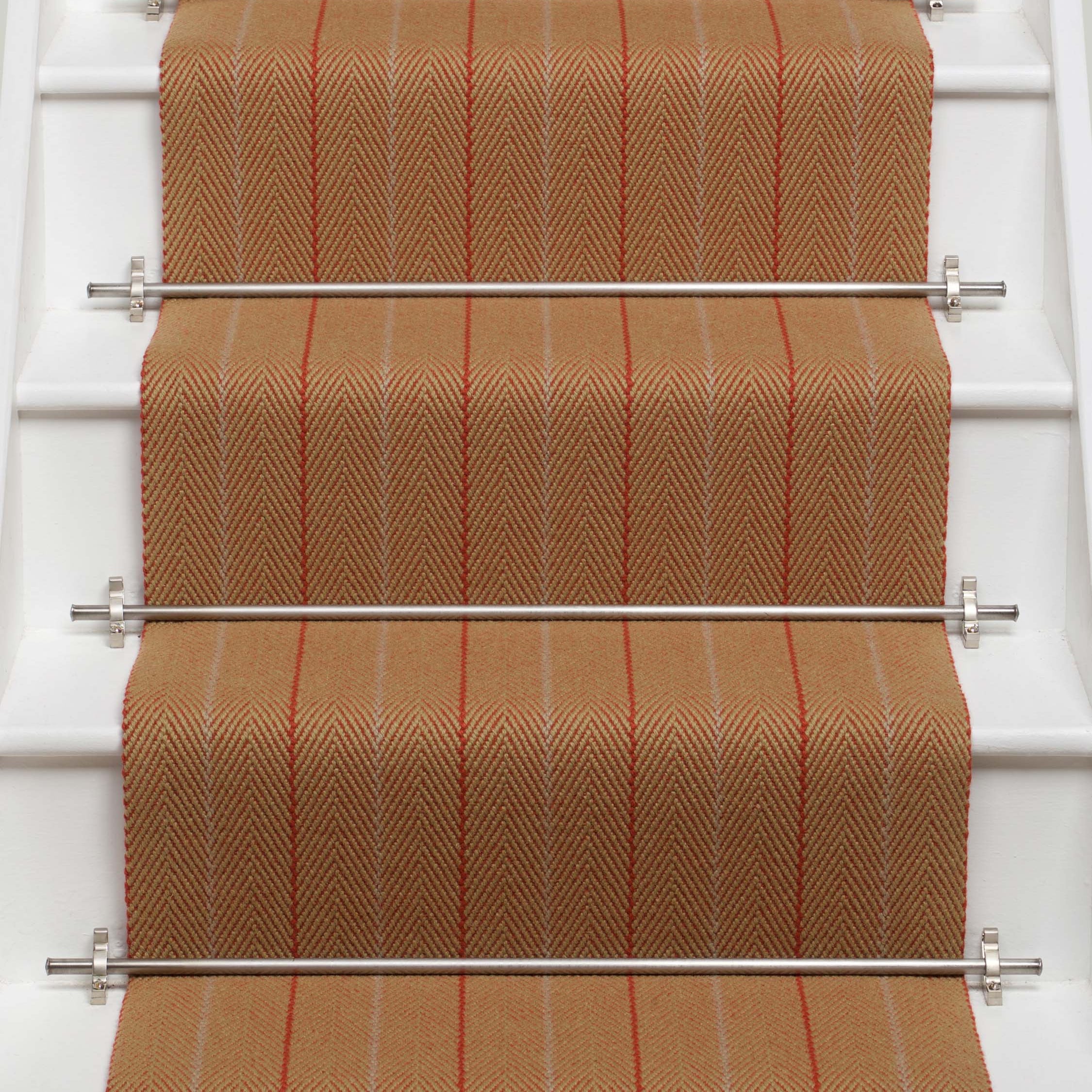 Striped flatweave runner in orange on white staircase