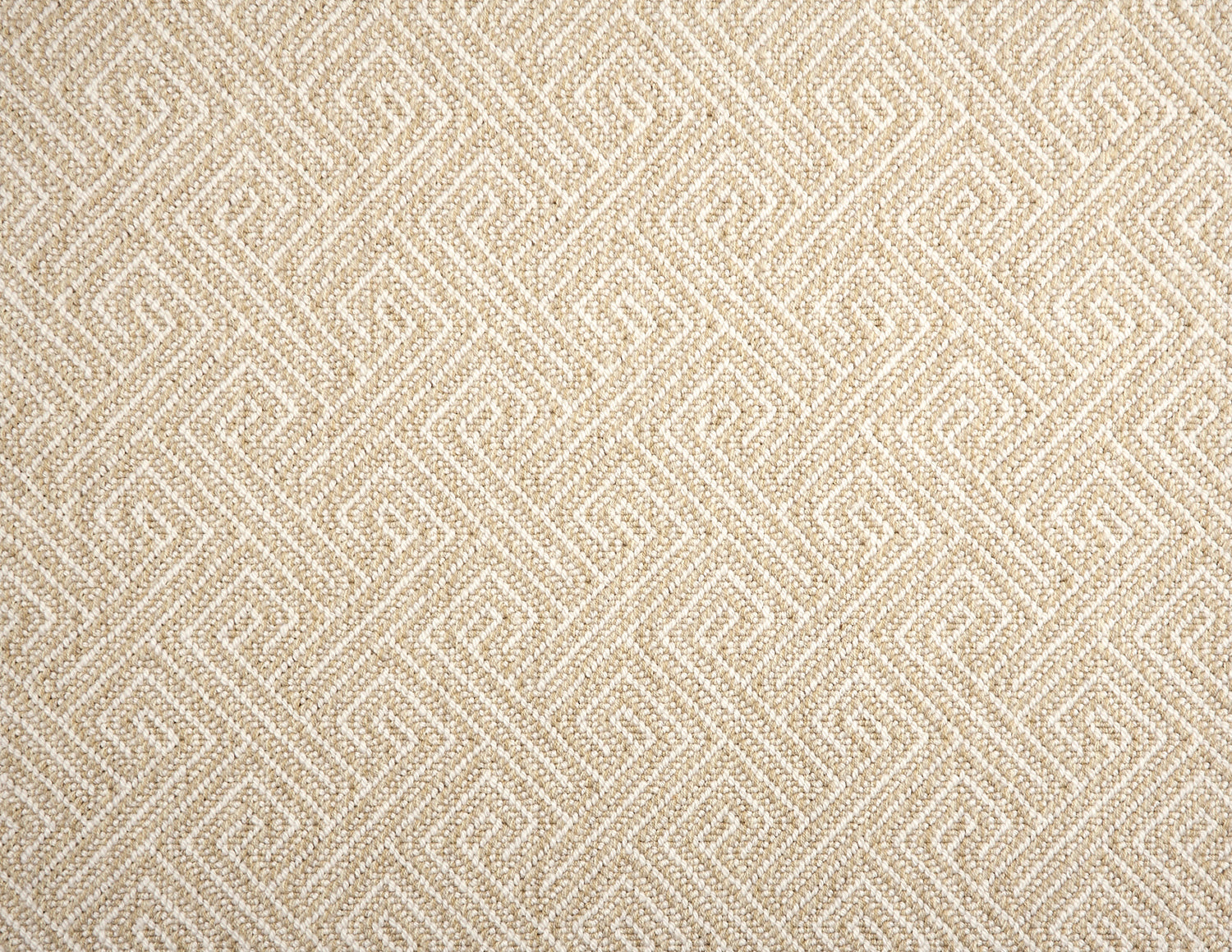 Broadloom carpet with Greek key pattern in cream on ecru.