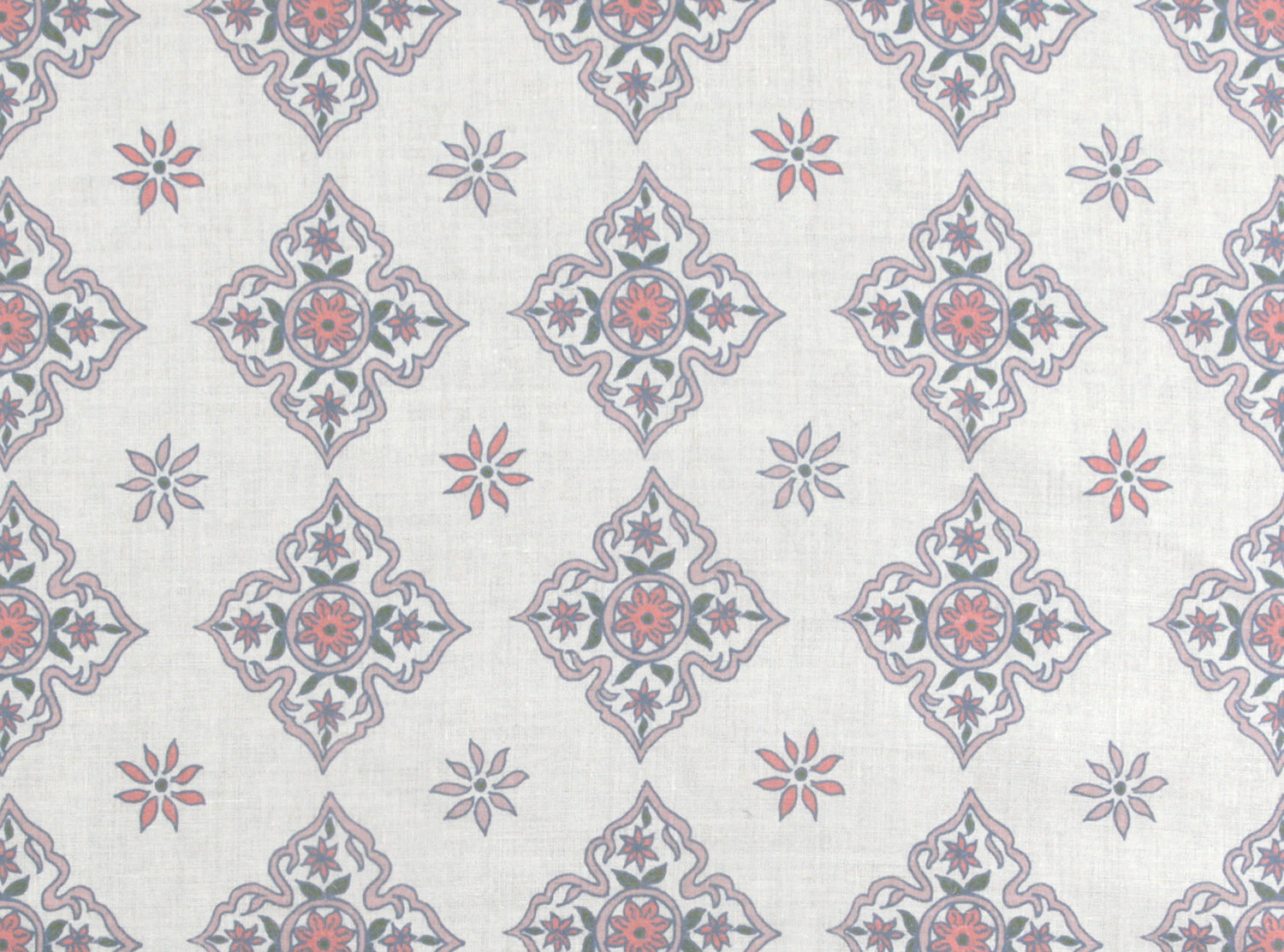Scaled-out view of fabric in a diamond damask print in shades of pink, purple, blue and green on a cream field.