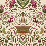 Detail of wallpaper in a floral damask print in shades of green and purple on a cream field.