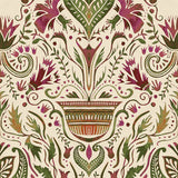 Detail of wallpaper in a floral damask print in shades of green and purple on a cream field.