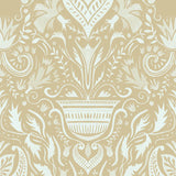 Detail of wallpaper in a floral damask print in cream on a tan field.
