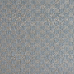 Close up of woven fabric with small scale checkerboard pattern in white and pastel blue.