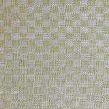 Close up of woven fabric with small scale checkerboard pattern in white and pale green. 