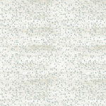 Detail of fabric in an abstract dotted pattern in light blue on a mottled cream field.