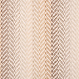 Broadloom carpet in a herringbone pattern with ombré stripe design in shades of brown with white. 