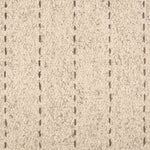 Broadloom carpet with a thin dashed stripe in taupe leather on a cream field