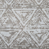 Broadloom carpet sample in a textural stacked triangle pattern in white and oatmeal.