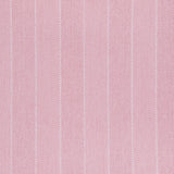 Broadloom carpet in a herringbone stripe pattern in pink.