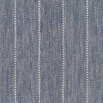 Broadloom carpet in a herringbone stripe pattern in slate blue.