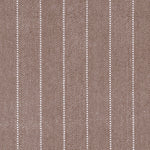 Broadloom carpet in a herringbone stripe pattern in brown.