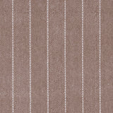 Broadloom carpet in a herringbone stripe pattern in brown.
