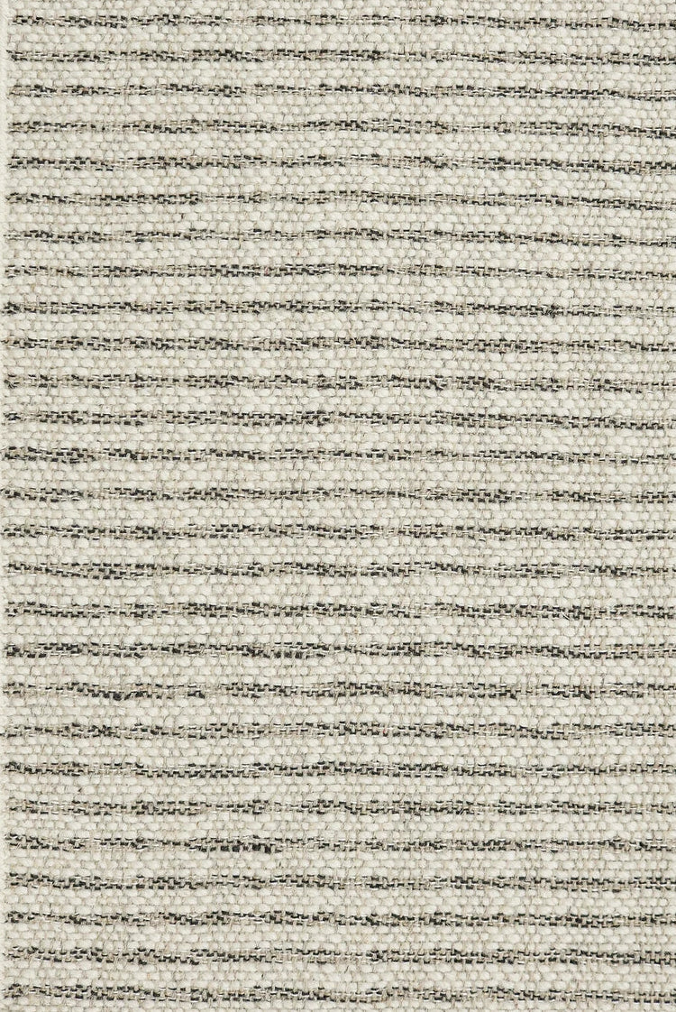 Textured broadloom carpet in a stripe pattern of cream and grey. 