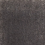Broadloom carpet in cut pile in charcoal grey. 