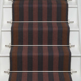 Striped flatweave runner in red ran and black on white staircase
