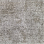 Broadloom carpet in taupe grey with subtle texture. 