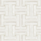 Detail of cream wallpaper in a large-scale interlocking geometric print.