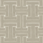 Detail of wallpaper in a large-scale interlocking geometric print in tan on a cream field.