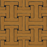 Detail of wallpaper in a large-scale interlocking geometric print in gold on a black field.