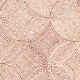 Broadloom carpet in a circular mosaic design in dense stripes of white and rust. 