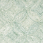 Broadloom carpet in a circular mosaic design in dense stripes of white and green.