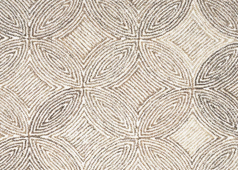 Broadloom carpet in a circular mosaic design in dense stripes of white and brown. 