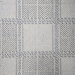 Broadloom carpet in wide box checkerboard pattern in cream and light blue.