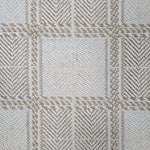Broadloom carpet in wide box checkerboard pattern in cream and tan.