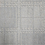 Broadloom carpet in wide box checkerboard pattern in light blue and cream. 