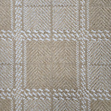 Broadloom carpet in wide box checkerboard pattern in tan and cream. 
