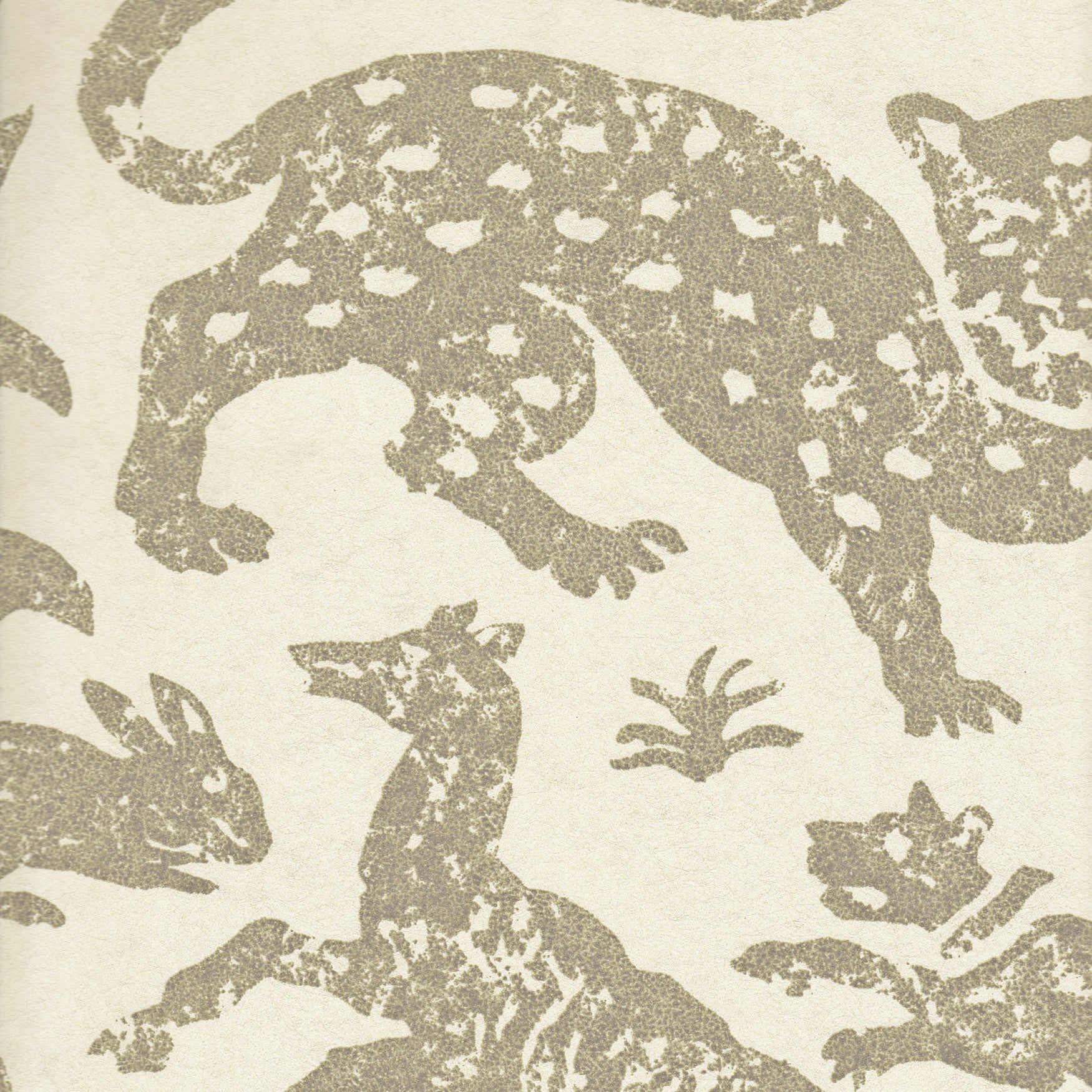 Detail of wallpaper in a playful animal print in tan on a cream field.