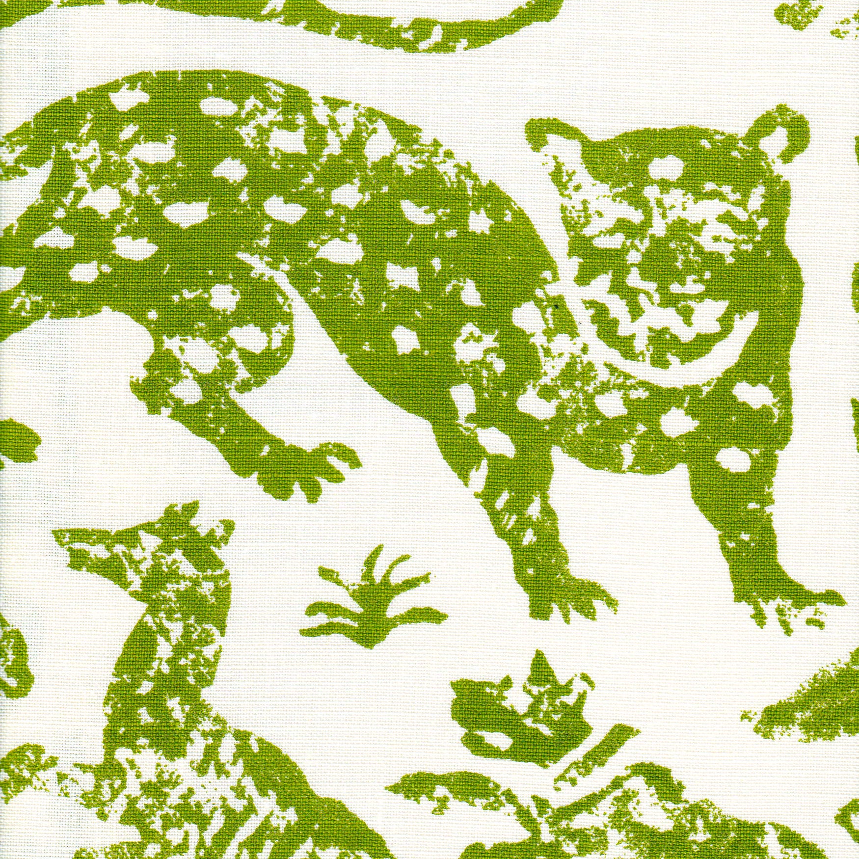 Detail of fabric in a playful animal print in green on a cream field.