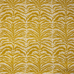 Detail of fabric in a linear botanical print in mustard on a mottled yellow and cream field.