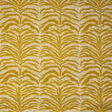 Detail of fabric in a linear botanical print in mustard on a mottled yellow and cream field.