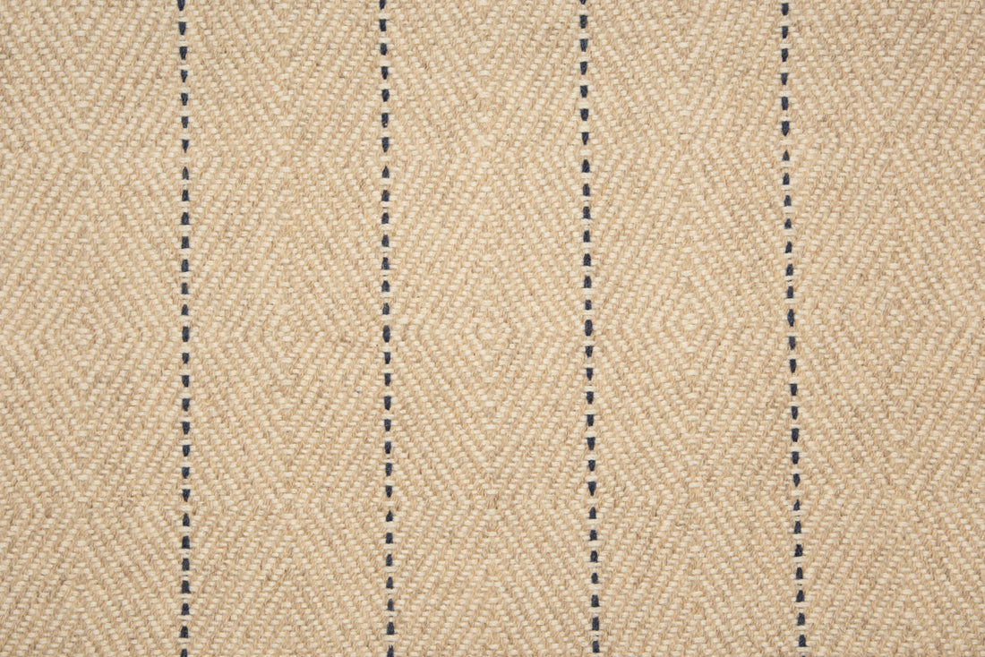 Broadloom carpet with diamond weave in oatmeal with widely spaced pin stripe in navy blue.